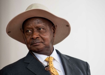 Uganda's President Yoweri Museveni waits for Ethiopia's Prime Minister before a welcome ceremony at State House in Entebbe on June 8, 2018. (Photo by Sumy SADRUNI / AFP)        (Photo credit should read SUMY SADRUNI/AFP/Getty Images)