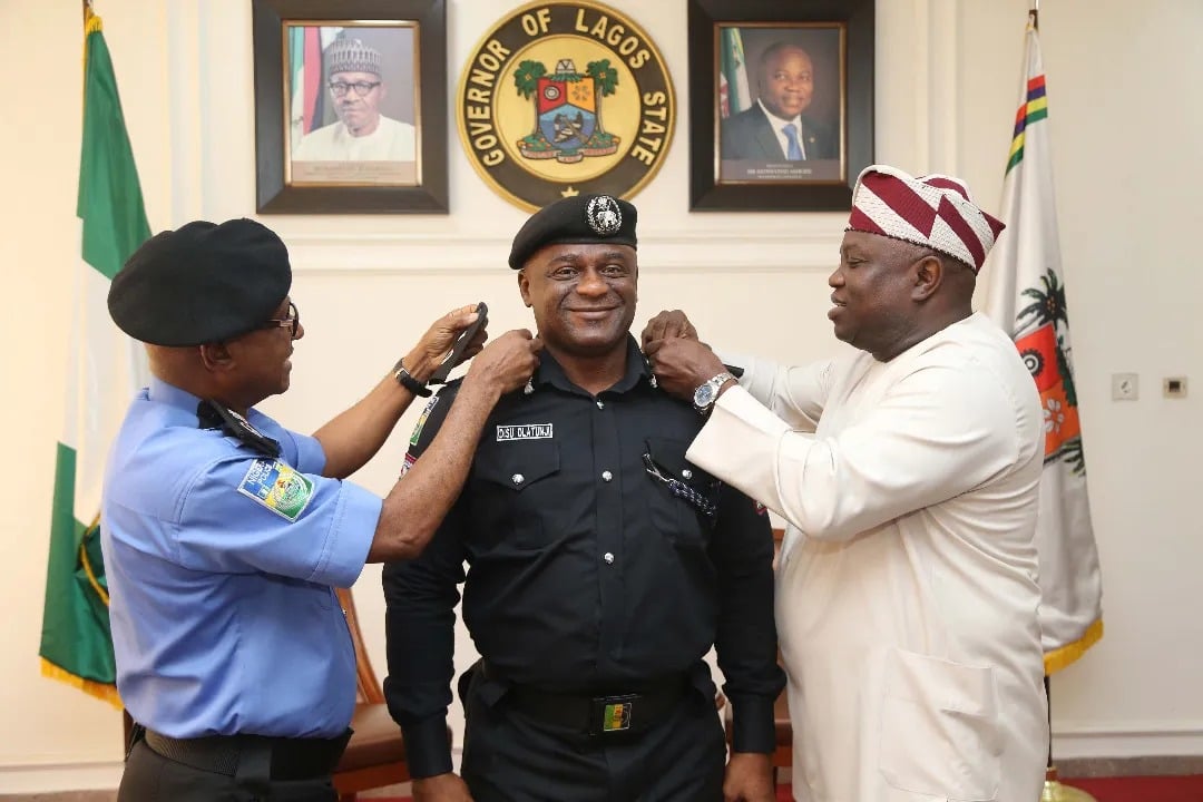 Tunji Disu being decorated by Akinwunmi Ambode, former governor of Lagos