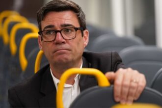 andy burnham bus pass funding