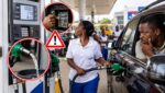Nigerian motorist refuelling a car at a petrol station while checking the fuel dispenser meter