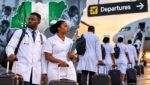 Nigerian doctors and nurses amid concerns over healthcare worker migration and medical brain drain.