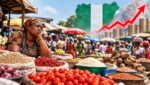 Nigerian shopper buying food staples at a market amid rising food prices and household budget pressures