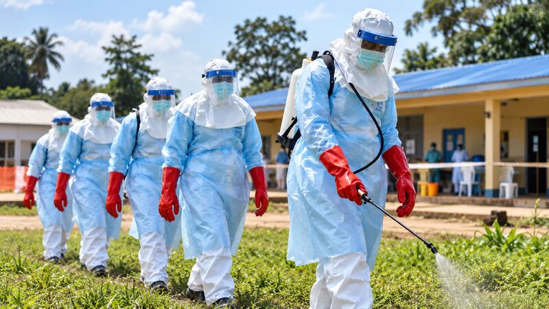 Healthcare workers in protective equipment during an Ebola disease response