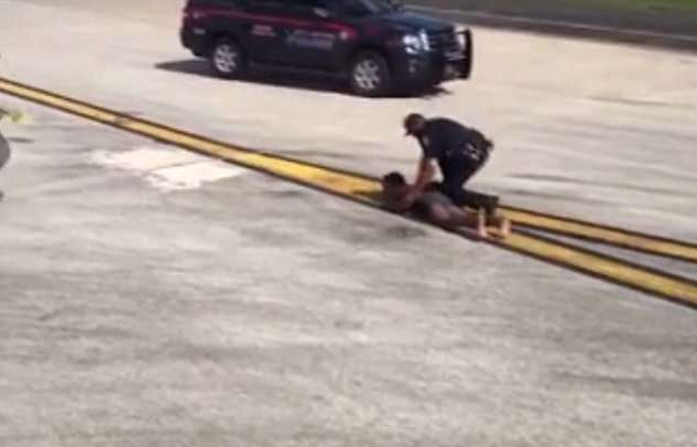 Half-naked man sprints toward Delta Air Lines plane at Atlanta airport after he jumped out of his plane and climbed onto the wing of another (video)