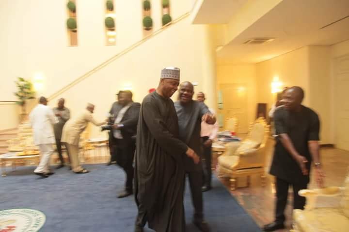Photos: Senate President Bukola Saraki visits Nyesom Wike with PDP displayed in the background