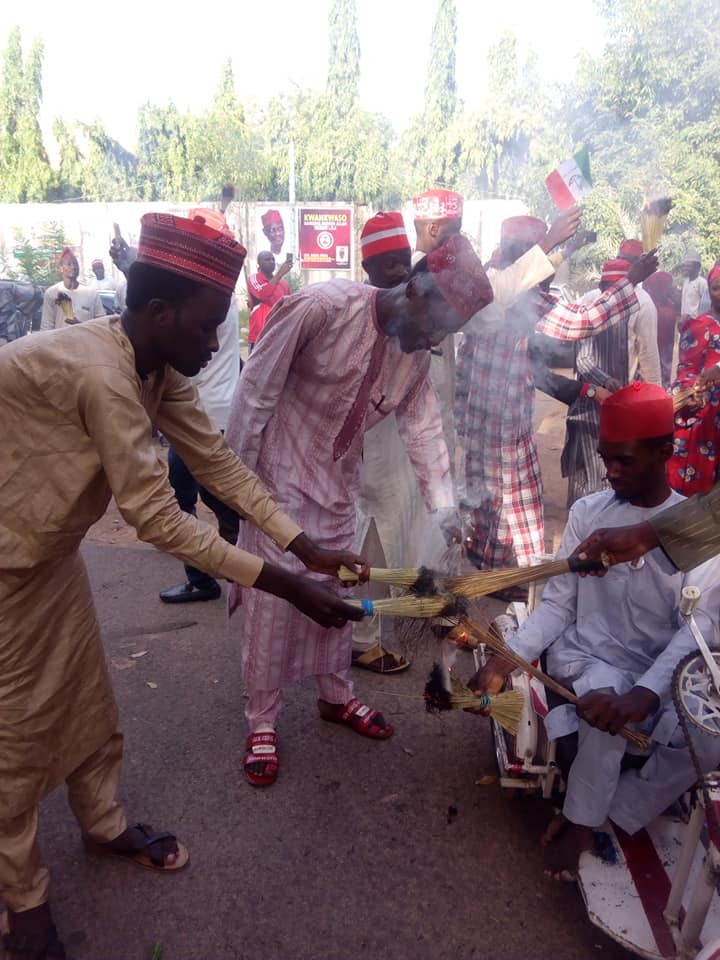 Photos: APC members in Kano state burn their brooms as their leader, Rabiu Kwankwaso defects to PDP