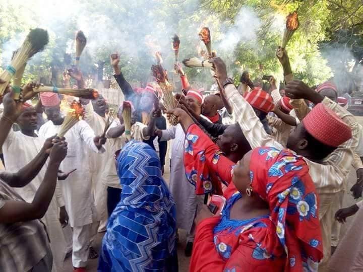 Photos: APC members in Kano state burn their brooms as their leader, Rabiu Kwankwaso defects to PDP