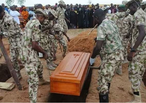 Photos from the mass?burial?of?Nigerian soldiers?killed by Boko Haram 