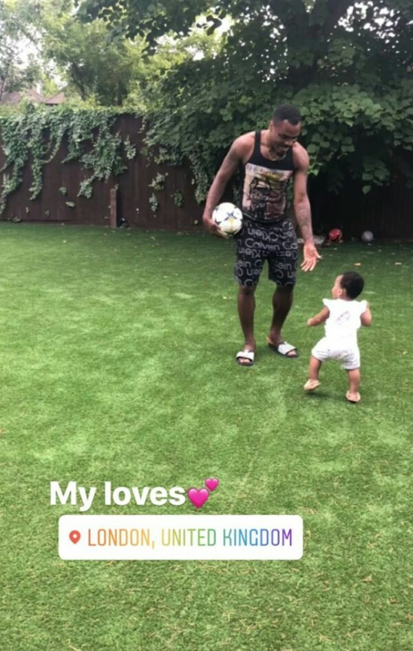 Adorable photos of Super Eagles player, Emmanuel Emenike playing with his daughter