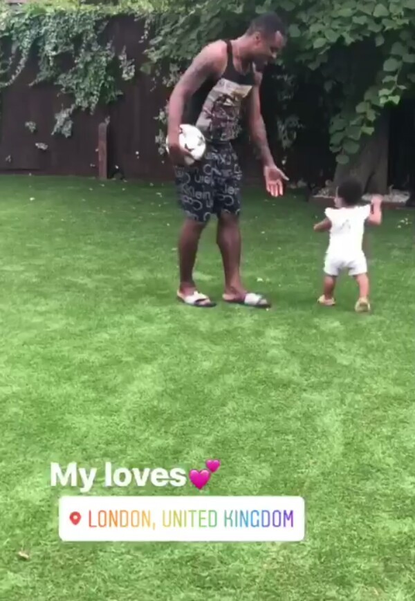Adorable photos of Super Eagles player, Emmanuel Emenike playing with his daughter