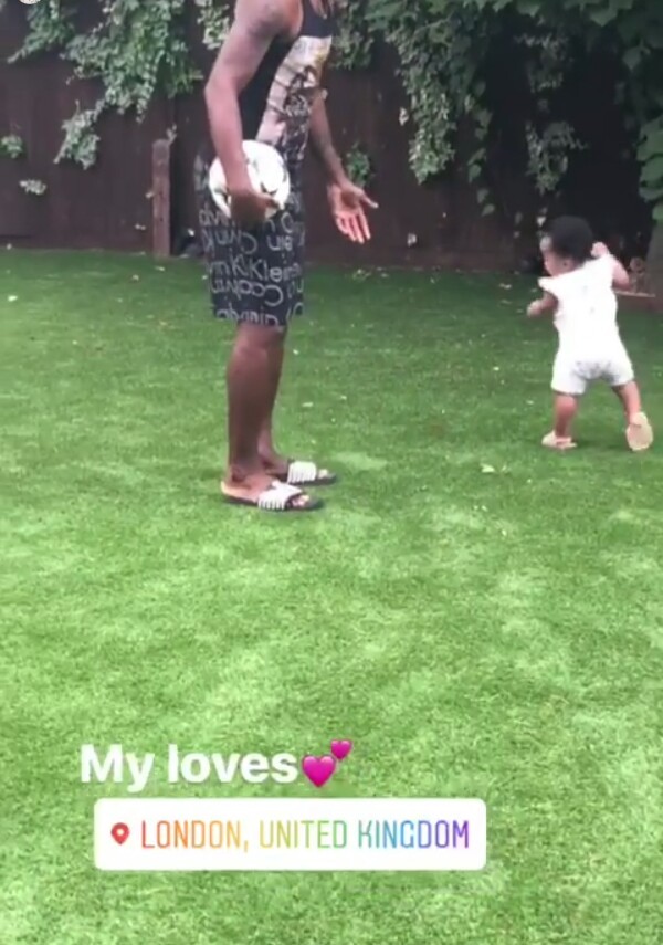Adorable photos of Super Eagles player, Emmanuel Emenike playing with his daughter